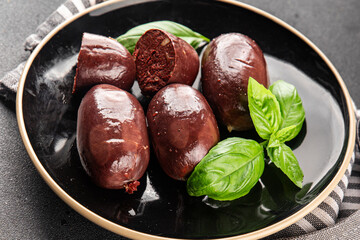 Black pudding sausage fresh delicious gourmet food background on the table rustic food top view...