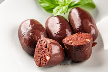 Black pudding sausage fresh delicious gourmet food background on the table rustic food top view...