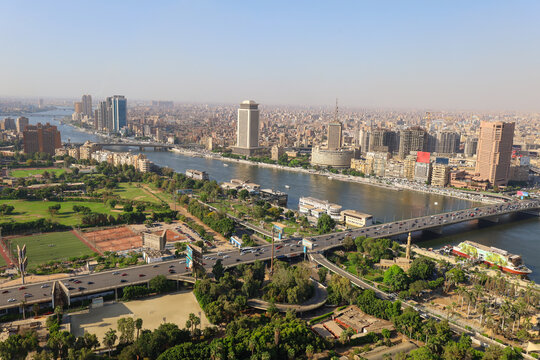 Fototapeta Egypt, Cairo, Aerial view of cityscape and Nile river - Cairo and Nile from above