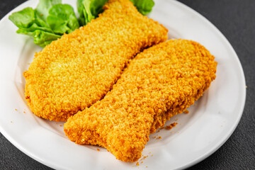 Fish sticks fishs shaped breaded fish nuggets fast food fresh delicious gourmet food background on the table rustic food top view copy space