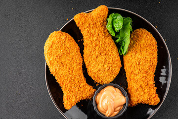 Fish sticks fishs shaped breaded fish nuggets fast food fresh delicious gourmet food background on...