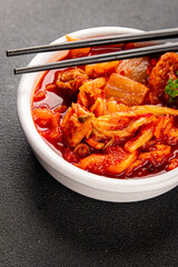 Kimchi pickled cabbage salad spicy savory vegetables fresh delicious gourmet food background on the table rustic food top view copy space vegetarian and vegan food
