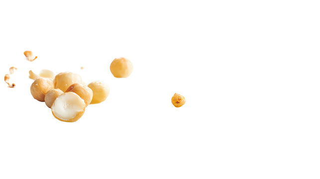 A pile of macadamia nuts, some whole and some cracked open, isolated on transparent background