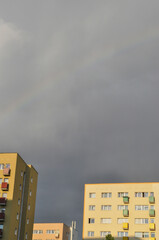 the city three apartment blocks cloudy stormy sky