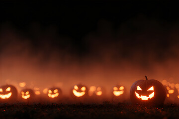 Jack o lantern pumpkins glowing in a dark Halloween night with misty orange light. Scary spooky atmosphere.