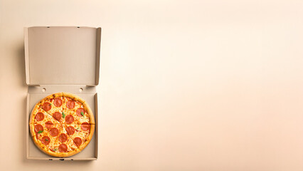 Flat lay of pepperoni pizza on open box with slices neatly arranged, pastel orange background, modern ad layout with space for discount text, clean shadows, designed for horizontal banner ad format