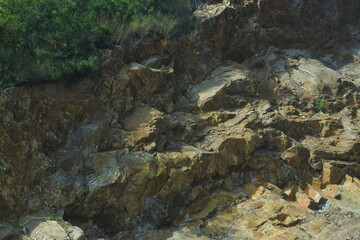 Stone mining, looks scattered with small rocks that have been processed from large rocks that come...