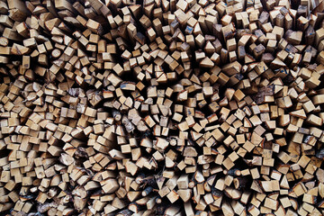 Firewood stack of natural wood background