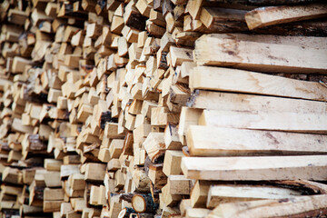 Firewood stack of natural wood background