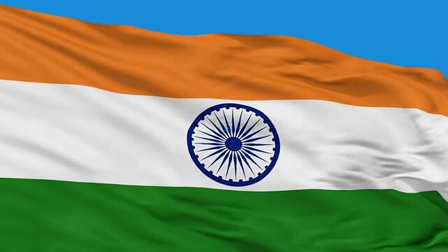 Waving Indian flag with horizontal bands of orange white and green and a blue chakra at the center