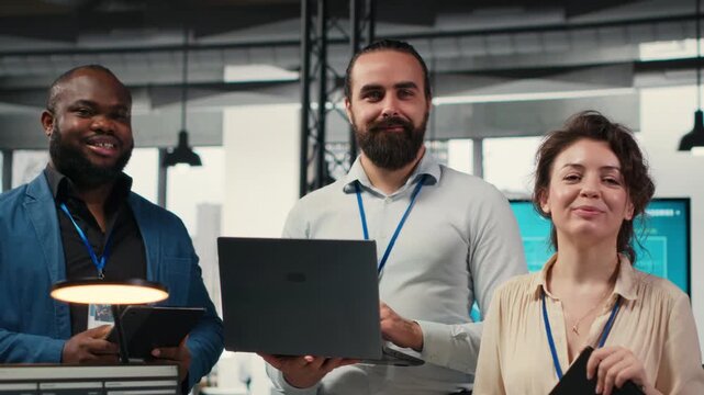 Portrait of diverse business associates analyzing data insights meeting in office, consulting the analysis forecast before developing a new strategy for the enterprise activity. Camera B. - Powered by Adobe