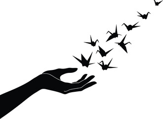 Poetic Silhouette of Origami Hand Releasing Paper Cranes