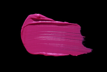 Cosmetic beauty product texture sample swatch. Creamy lipstick or lip gloss swatch isolated on black