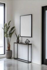 A sleek and modern home entryway featuring a vertically oriented blank picture frame mounted prominently on a clean white wall Below the frame a minimalist console