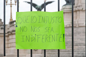 Poster: Let us not be indifferent to injustice.