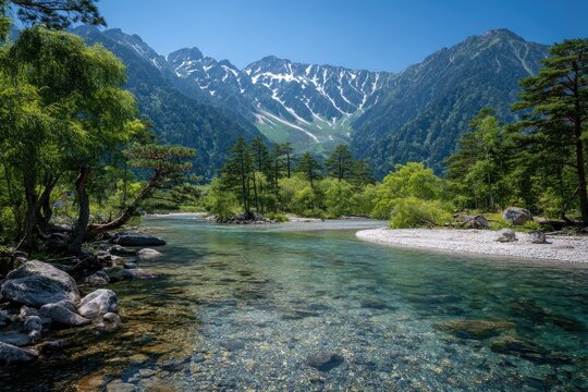 Japan Alps summer river, clear water, mountain backdrop, postcard scene