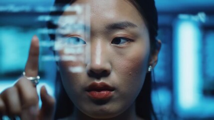 Asian Woman Interacting with Futuristic Interface, Touching Holographic Data Display in Blue Light - Powered by Adobe