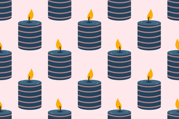 Seamless pattern with dark blue striped candles on soft pink background