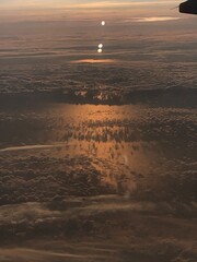 Sunset over the clouds from a plane 
