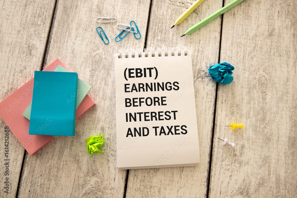 Poster there is notebook with the word ebit. it is an abbreviation