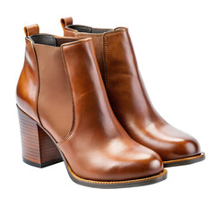A pair of shiny brown leather chelsea ankle boots with block heels isolated on transparent background