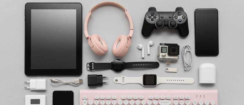 Composition with various modern devices on grey background