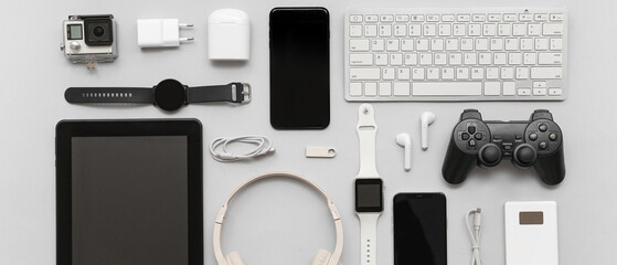 Composition with various modern devices on grey background
