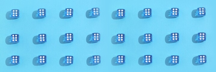 Many dices on blue background, top view. Pattern for design