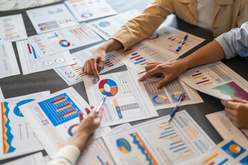 Business team startup presenting data summary chart meeting with colleagues, financial report...