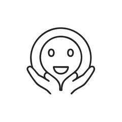 Obraz premium Hands holding a smiling face icon representing care and happiness