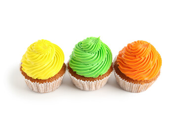 Tasty colorful cupcakes on white background