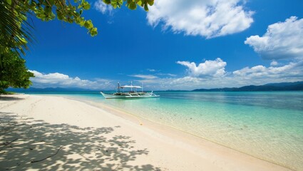 Fototapeta premium Idyllic tropical beach with traditional boat and clear turquoise water