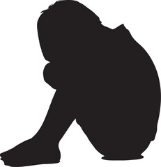 Silhouette of a person curled up in despair sadness