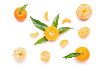 Many sweet mandarins with leaves on white background