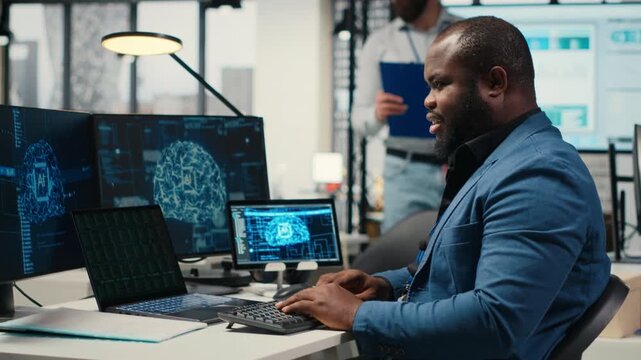 Professional advisor reviewing KPI reports with artificial intelligence tools on computer, working with AI neural networks for machine learning. Emphasizing innovation and optimization. Camera B.