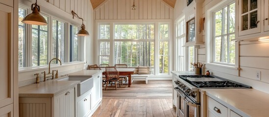 Elegant modern farmhouse kitchen bathed in natural light with forest views