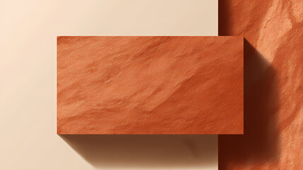 Terracotta slab set against vertical eggshell surface