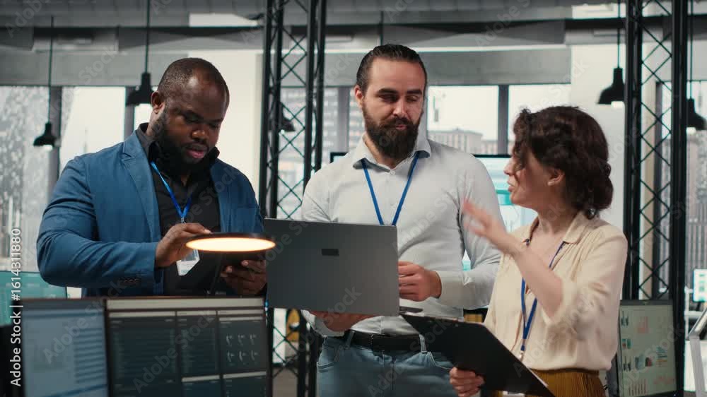 Poster diverse group of employees collaborate on project planning and analysis, using data from charts on t