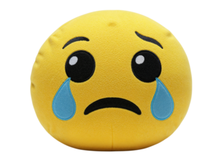 A sad emoji pillow with tears rolling down its cheeks isolated on transparent background