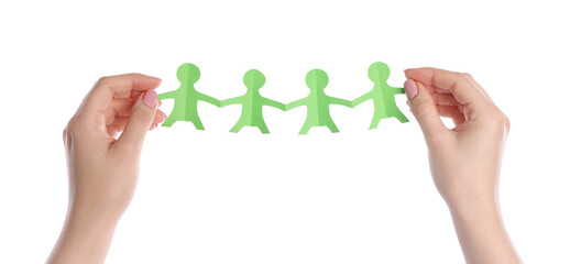 Woman holding paper figures of people on white background, closeup