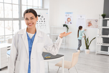 Female ophthalmologist working in clinic