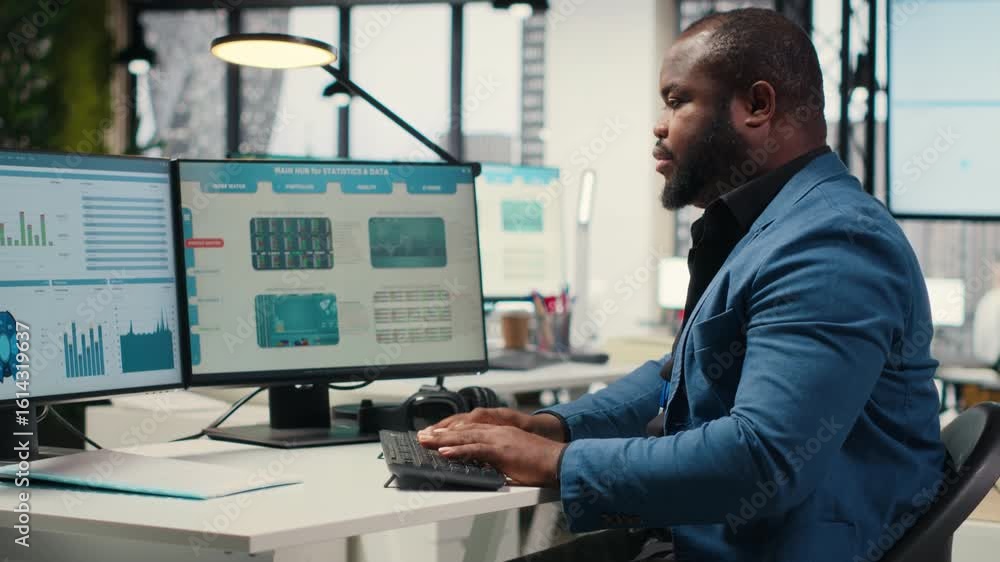 Poster black male analyst focused on it company development with digital tools, review analytics and perfor