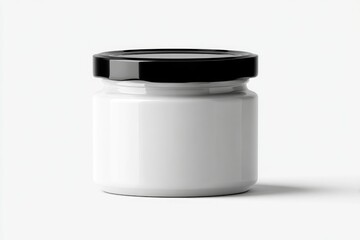 A small, cylindrical white glass jar with a black lid sits on a white background, casting a subtle shadow