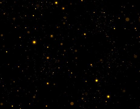 Golden sparkles on black background
