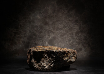 textured stones for podium background stands.real stones on dark background for cosmetic...