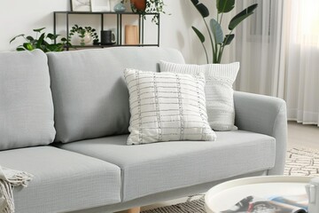 Modern Light Grey Sofa with Decorative Pillows in a Bright Living Room