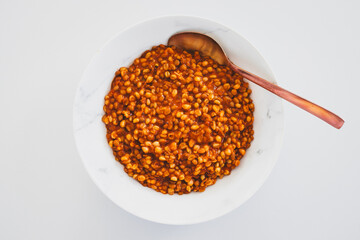 cooked freekeh with lentils and tomato sauce for a healthy vegetarian meal