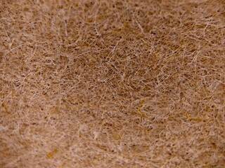 Abstract Brown Fiber Texture CloseUp of Interwoven Strands and Porous Surface.