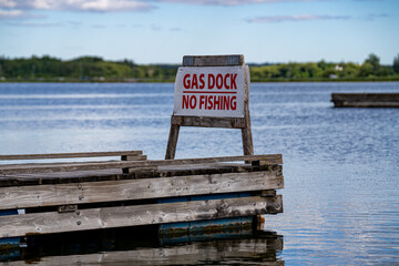View of Gas Dock - No Fishing sign at marina.