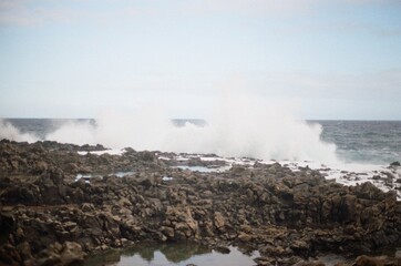 waves crashing on the rocks